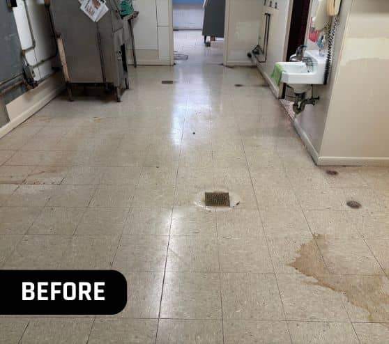 old stained tile flooring in Knights of Columbus kitchen