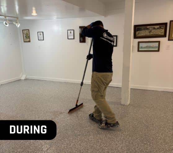 close-up of employee installing new flooring for mathews museum