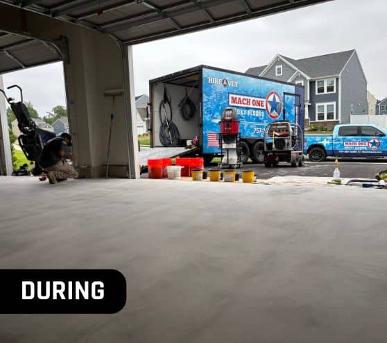 MACH ONE® employees installing new flooring for homeowner garage