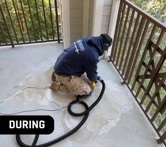 mach one® employee installing new flooring on back patio