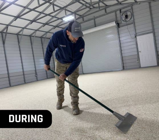 MACH ONE® employee installing new flooring for homeowner garage