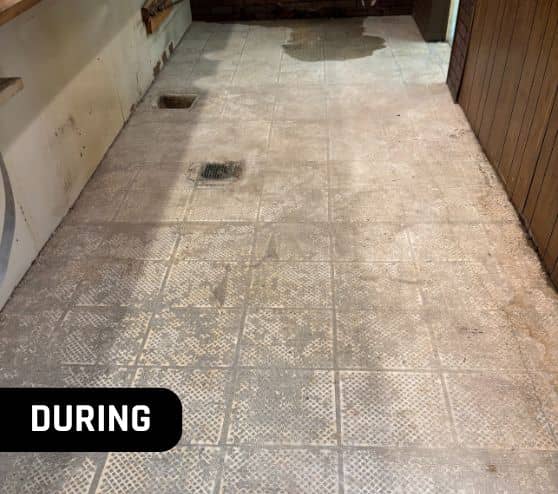 old flooring getting ripped up before epoxy is installed