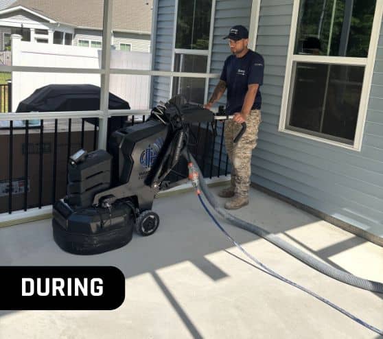 MACH ONE® employee in the middle of installing new flooring for homeowner