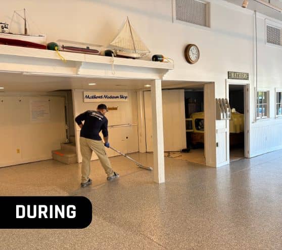 during portrait of mach one® employee installing new flooring for mathews museum