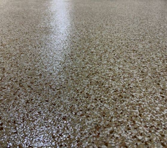 close-up of Medium Tan Epoxy Flake Flooring