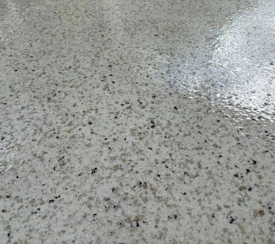 close-up of plateau epoxy flake flooring for homeowner