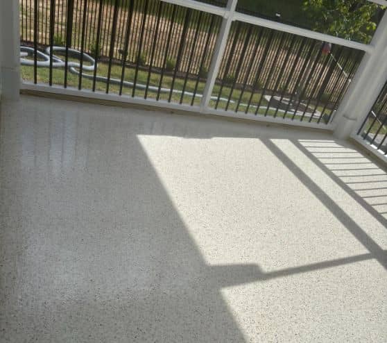 homeowner patio with new plateau epoxy flake flooring installed