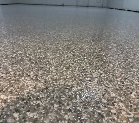 close-up of stoney creek epoxy flake flooring