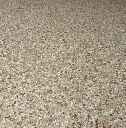 medium tan flake epoxy flooring installed for homeowner two car garage