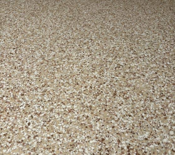 medium tan flake epoxy flooring installed for homeowner two car garage