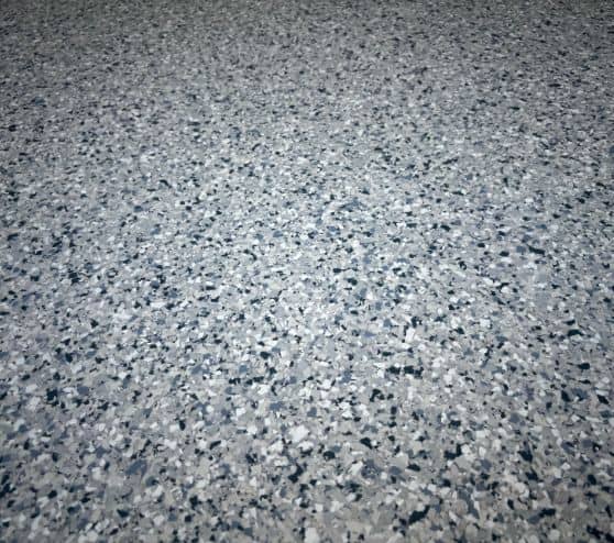 close-up of tidal wave epoxy flake flooring