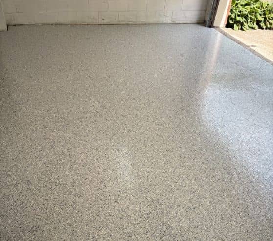 close-up of tidal wave epoxy flake flooring for homeowner garage