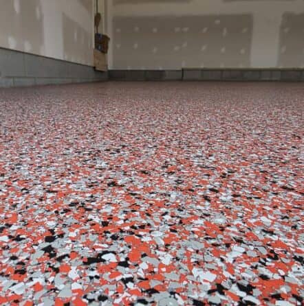 close-up of red epoxy flake flooring for homeowner