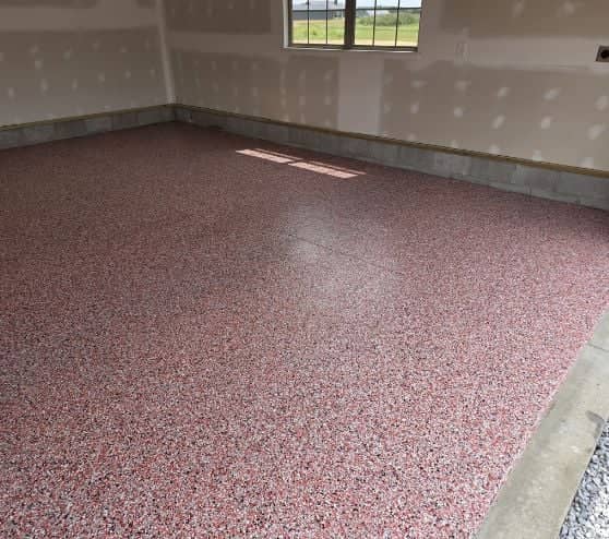 homeowner garage with new flooring installed