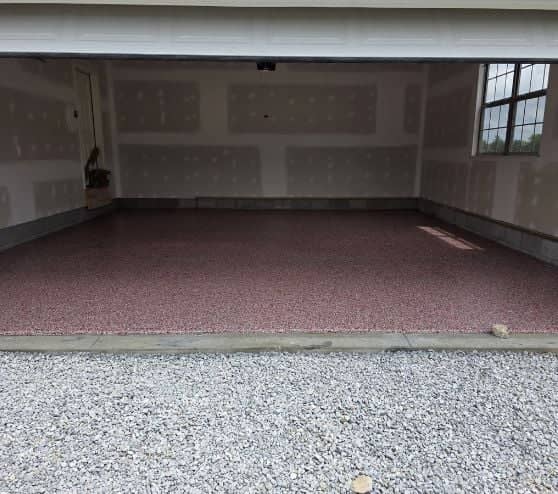 front view of homeowner garage with new epoxy flake flooring