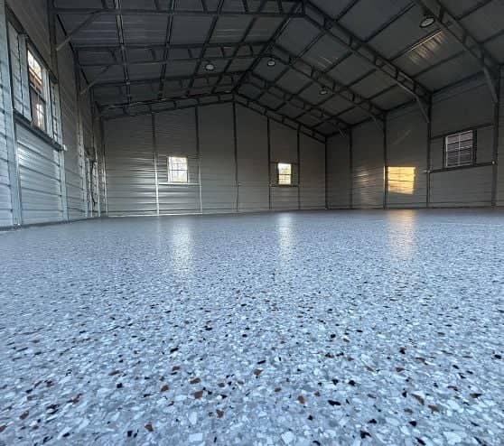 close-up of outback epoxy flake flooring installed for homeowner warehouse