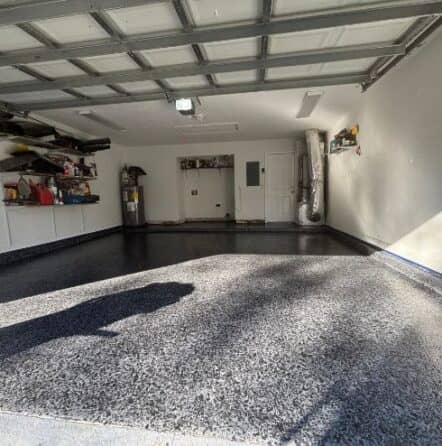 fernando garage with new epoxy flake flooring