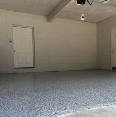 homeowner garage with new epoxy flooring installed