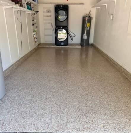 front view of homeowner garage with new epoxy flake flooring