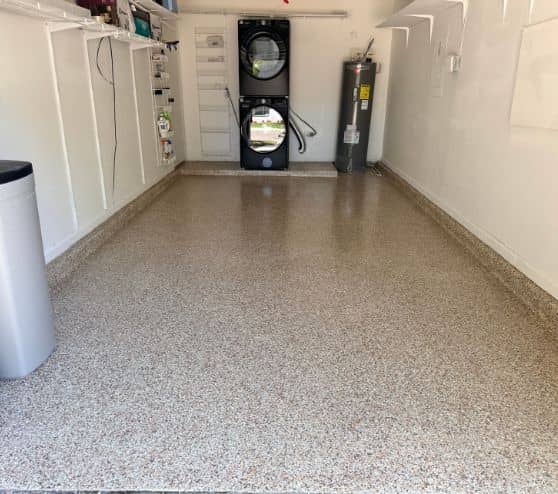 front view of homeowner garage with new epoxy flake flooring
