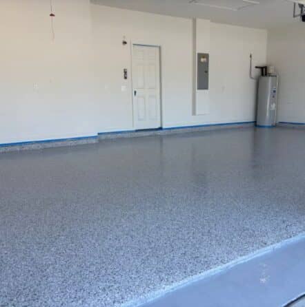 steve garage with new epoxy flake flooring installed