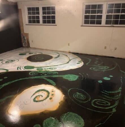 homeowner garage with new solid epoxy flooring installed