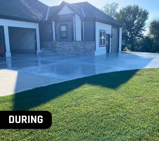 during portrait of homeowner driveway with new epoxy flooring