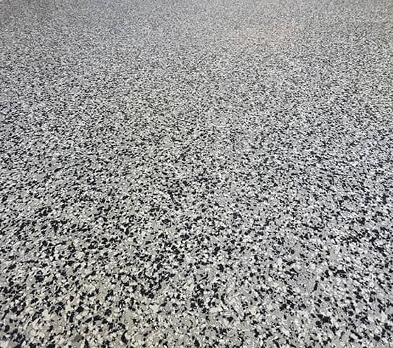 Epoxy flooring with domino flakes
