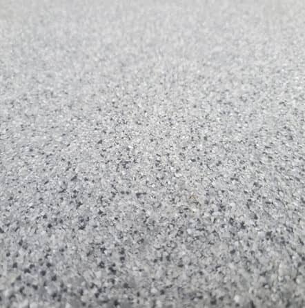a close up of gray epoxy flooring