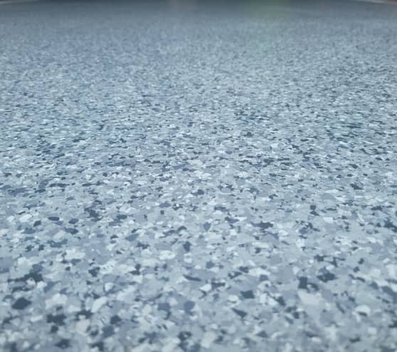 a close up of nightfall ¼ flake flooring