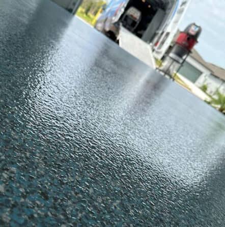 blue multi-colored epoxy application in tampa garage