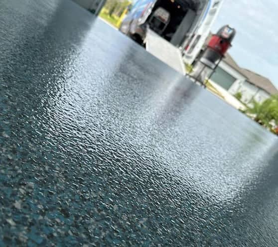 blue multi-colored epoxy application in tampa garage