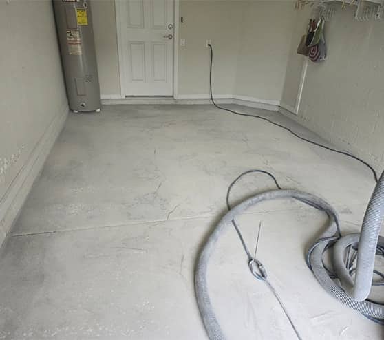 garage floor before epoxy flooring