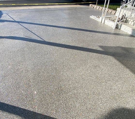 close-up of Custom Blend Epoxy Flake Flooring for homeowner patio