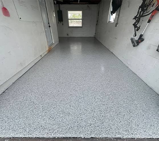 homeowner garage with new installed epoxy flake flooring