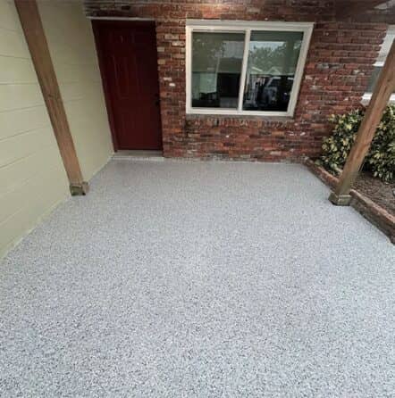 homeowner patio with new epoxy flake flooring installed