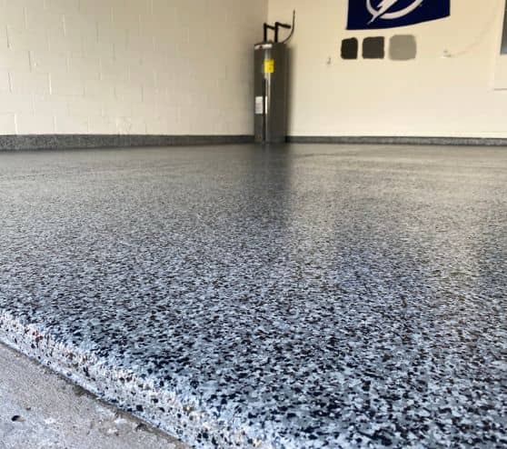 close-up of epoxy flake flooring installed for homeowner garage