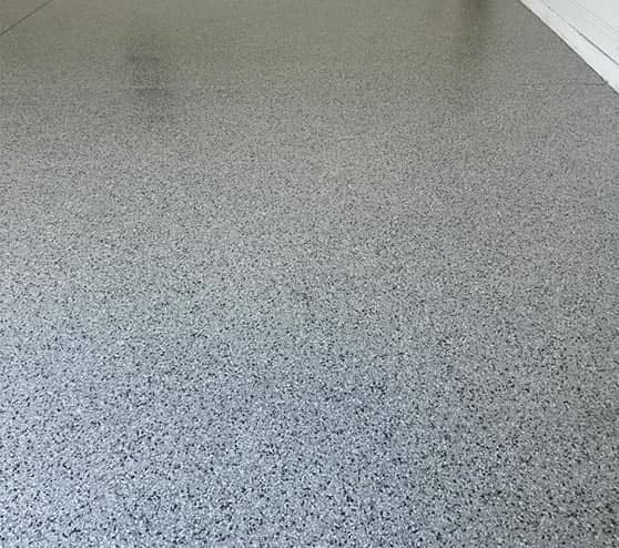 close-up of lunar epoxy flake flooring