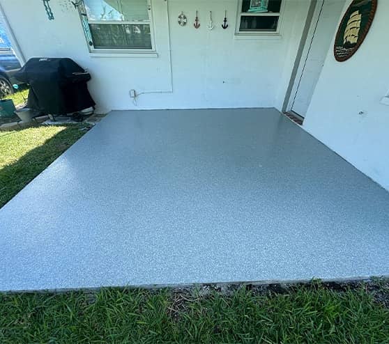 homeowner patio with epoxy flake flooring