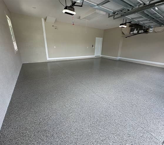 interior view of garage with epoxy flake flooring