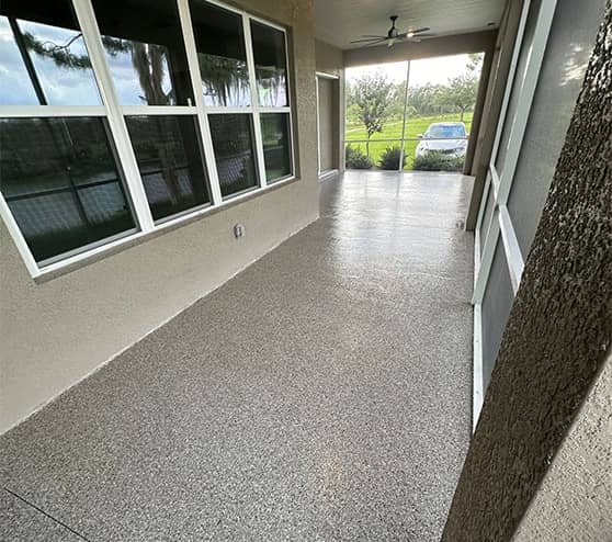 outdoor patio for homeowner with new epoxy flake flooring