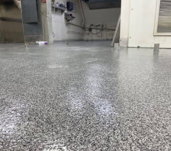 close-up of epoxy flake flooring for Yacht Starship Cruises