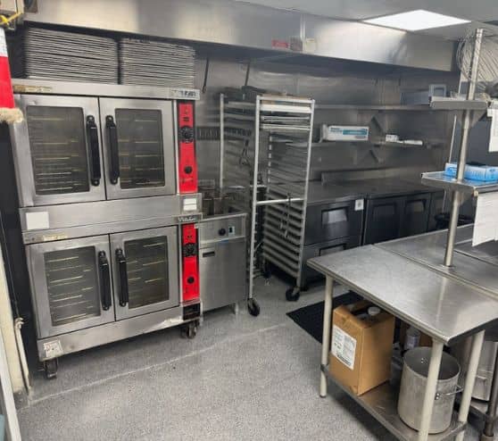 appliances in kitchen with new flooring for cruise ship