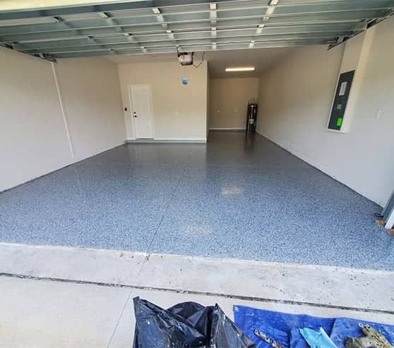 close-up view of garage with epoxy flooring