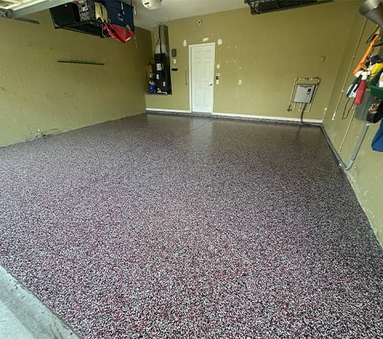homeowner garage with new epoxy flake flooring