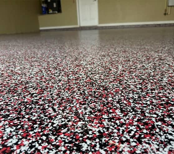 close-up of red epoxy flooring for homeowner garage