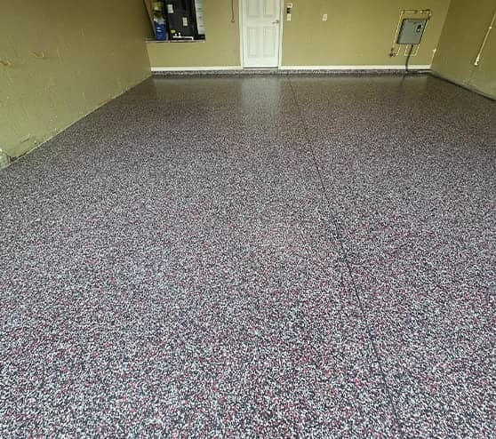 close-up of epoxy flake flooring in garage