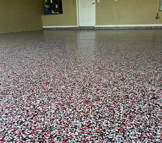 red epoxy flake flooring close-up for garage