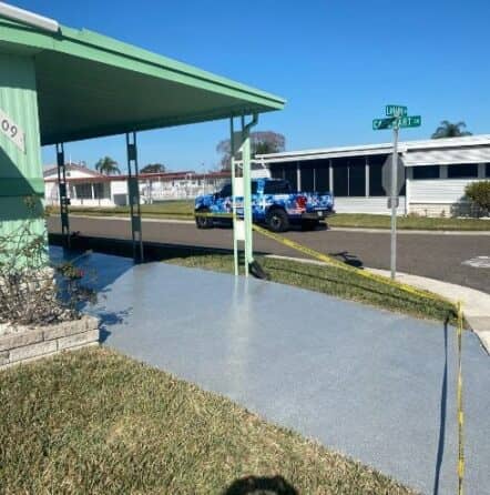 homeowner driveway with Grey Epoxy Flake Flooring installed
