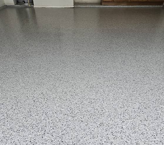 close-up of flake flooring in garage